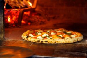 pizza in wood fired oven